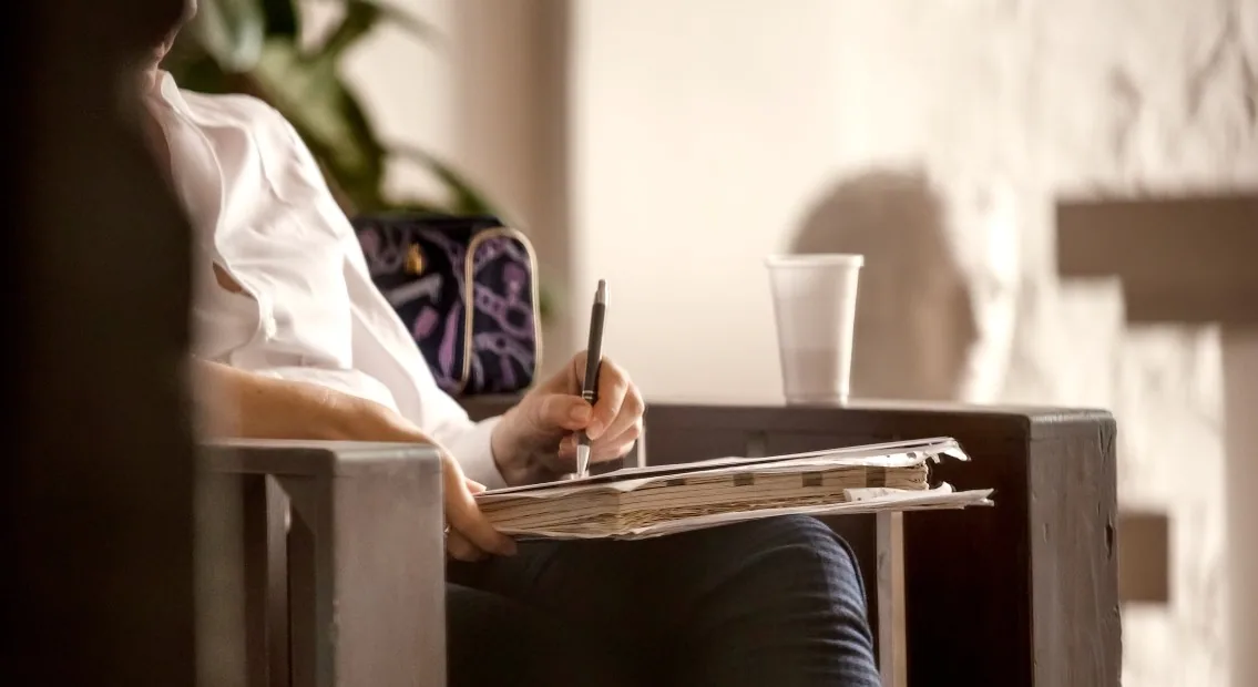 Woman sitting quietly during a calming therapy session New Day Therapies Hull