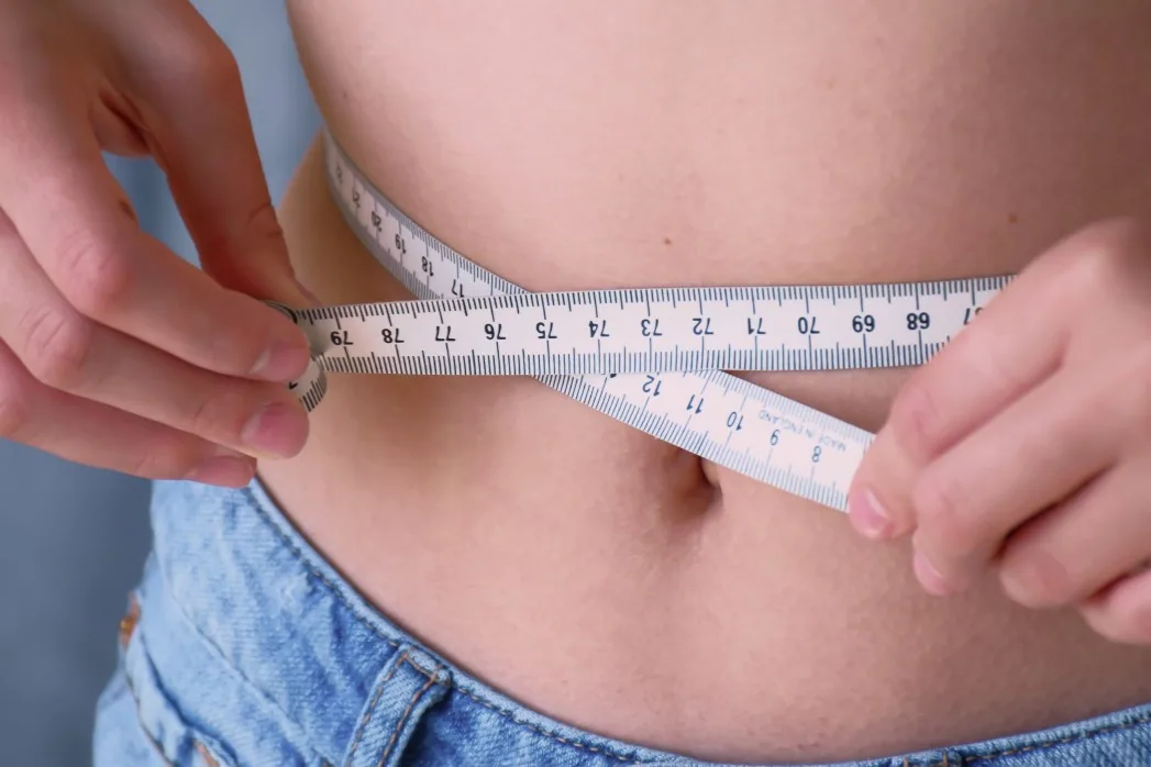 Person reflecting on their relationship with food and body image New Day Therapies Hull